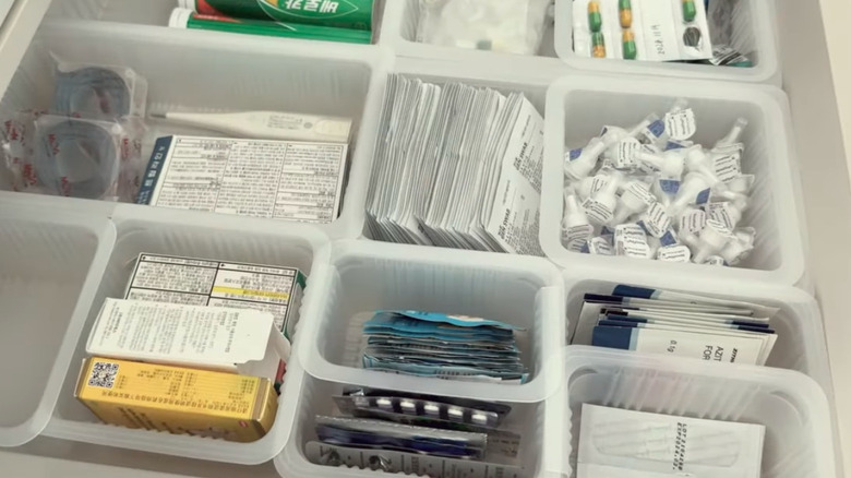 a drawer organizer made from old tofu containers