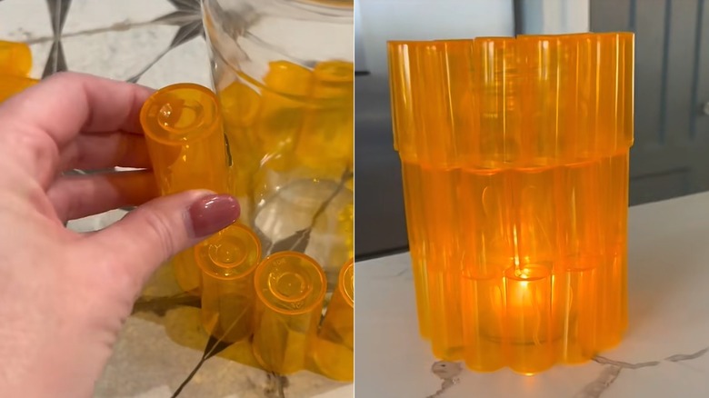 Hand gluing prescription bottles onto jar and finished lamp