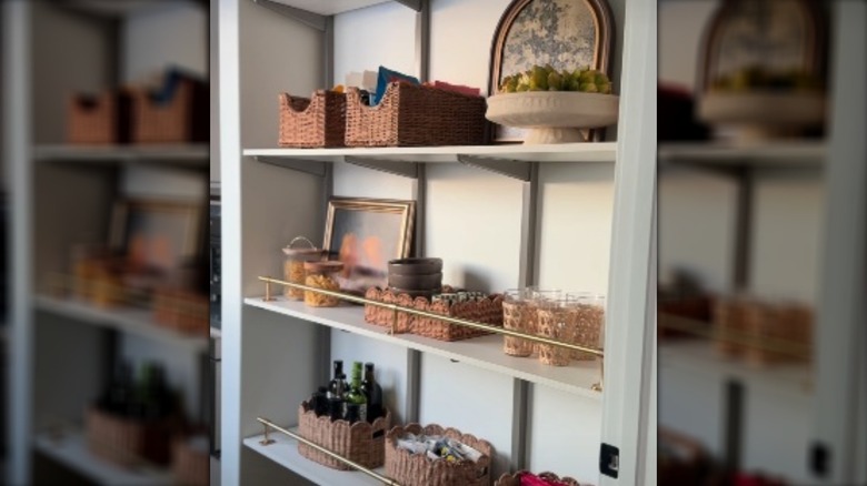 Rail enclosed shelving with decorations