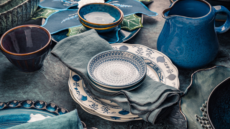 Blue stoneware plates and bowls on a table