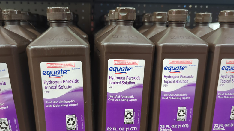 bottles of Equate hydrogen peroxide solution in a store
