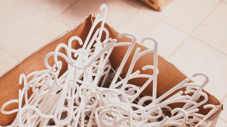 Easy Dollar Tree DIY Turns Broken Hangers Into A Countertop Clutter Buster