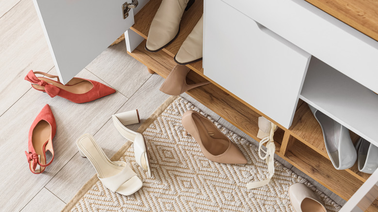 Entryway cluttered with shoes