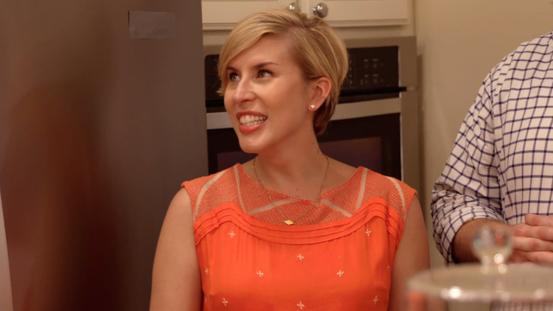 Erin Napier in an orange shirt