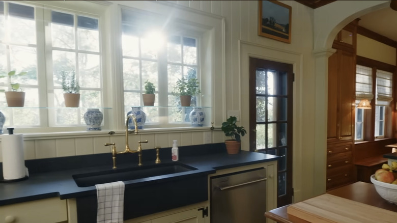 Erin Napier's country house kitchen with off-white V-Groove backsplash and walls