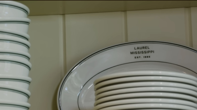 close up of V-Groove backsplash with plates in front at Erin Napier's country house