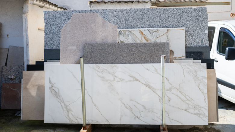 display rack full of miscellaneous remnant stone slabs