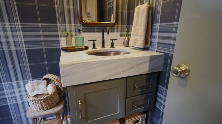 Erin Napier's stone bathroom vanity top with thick mitered edge on Home Town episode