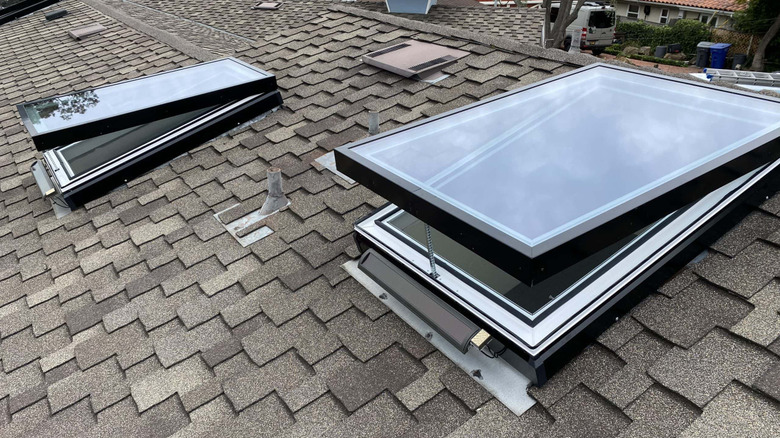 a pair of Solatube venting skylights