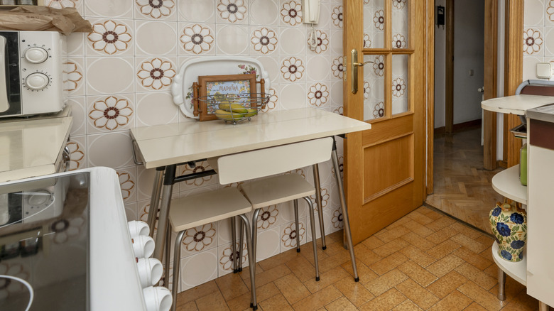 Beige Formica table and chair set in a retro home