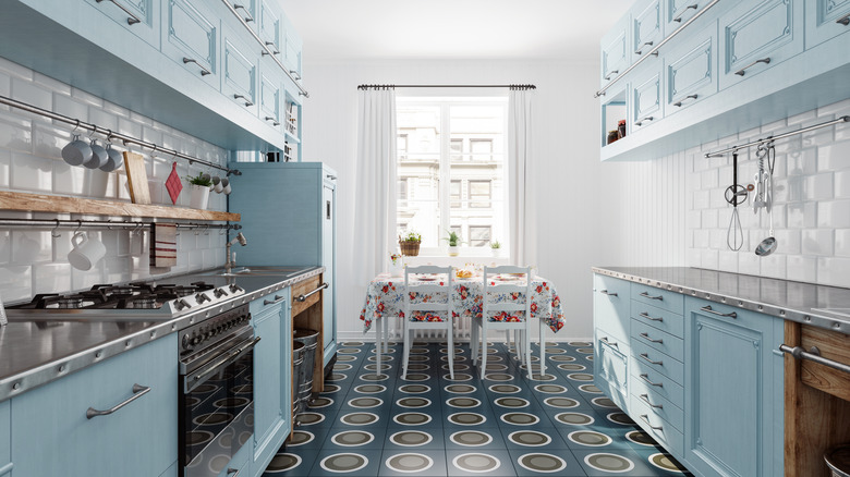 Retro blue and white tiled 1950s style kitchen