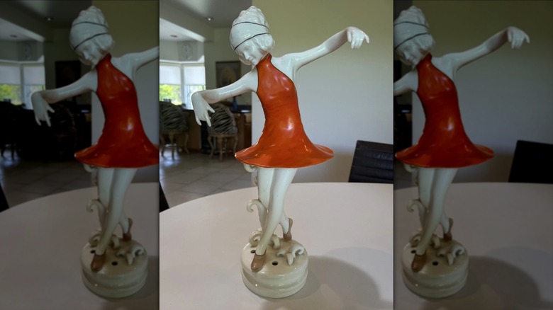 Dancing lady flower frog on a table
