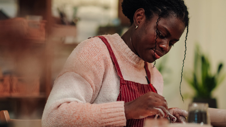 Woman working on craft projects