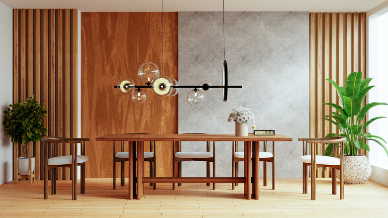 midcentury dining room with funky lighting