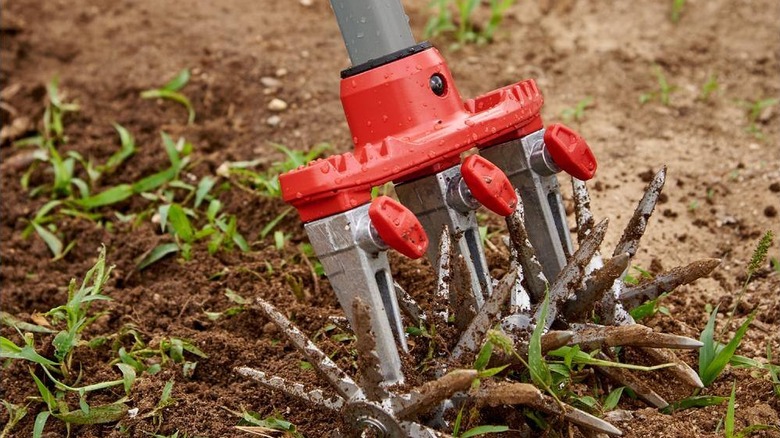 Corona Max adjustable DiscCultivator tilling a nearly bare yard