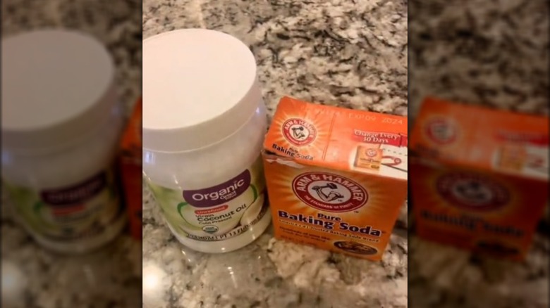 baking soda and coconut oil on a counter