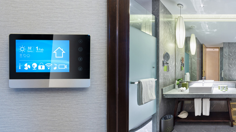 a smart screen outside bathroom