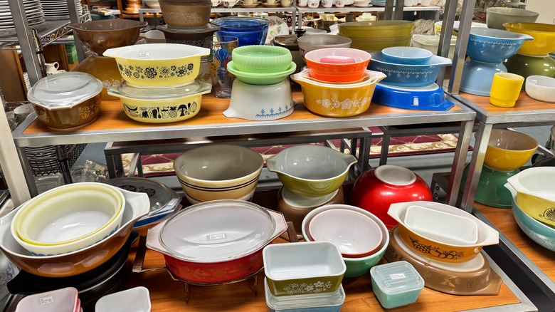 Collection of vintage Pyrex at a thrift store
