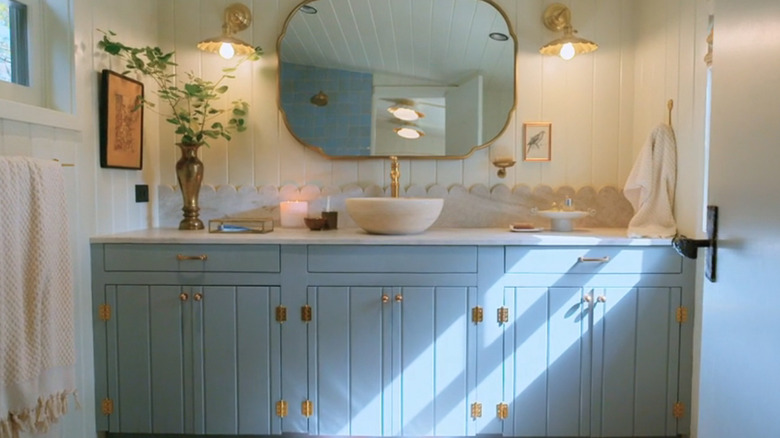 Scalloped soapstone bathroom backsplash
