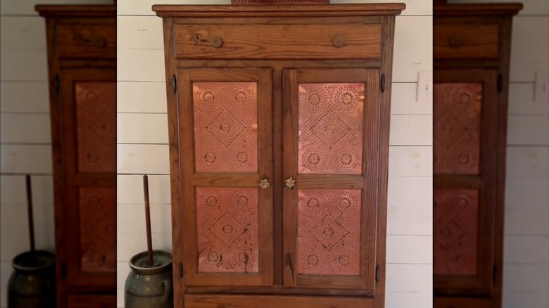 Beautiful vintage pie safe in home