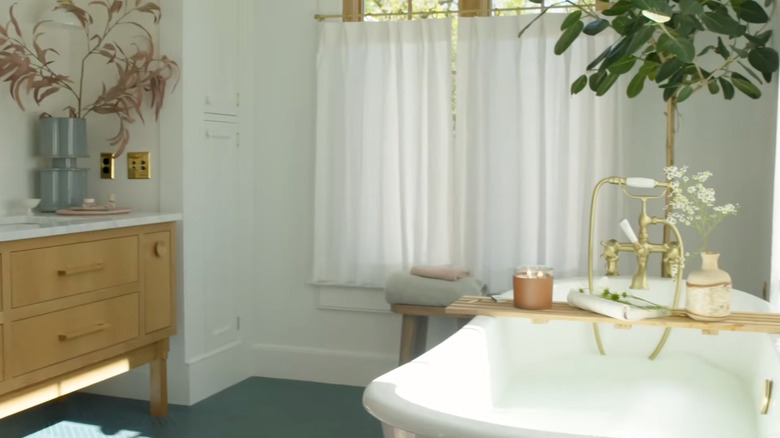 Bathroom window with white cafe curtains