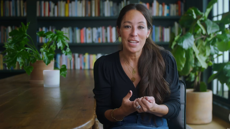 Joanna Gaines smiling in home library