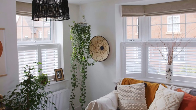 Cafe shutter over windows in a clean aesthetic living room