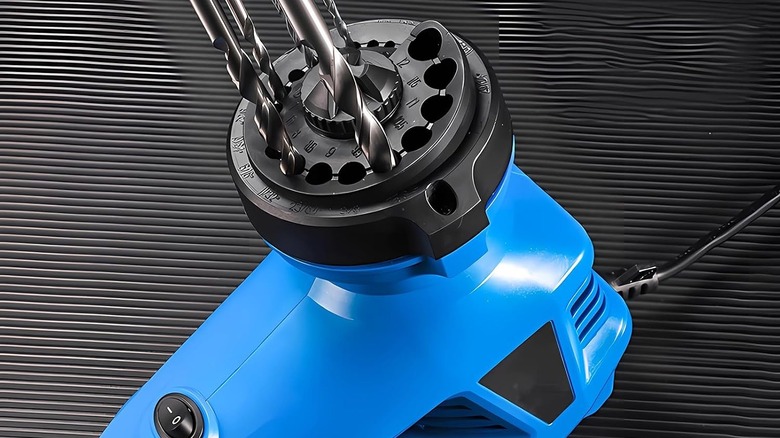 MDPSDS electric drill bit sharpener with a blue body and black holes for drill bits