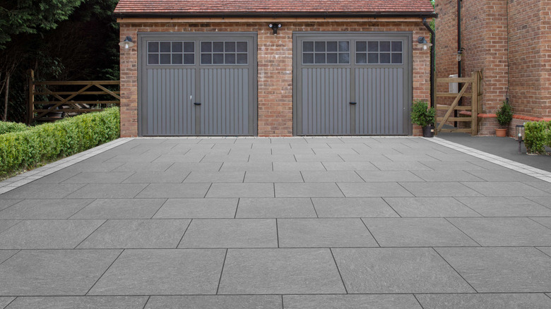 Porcelain driveway in front of a garage