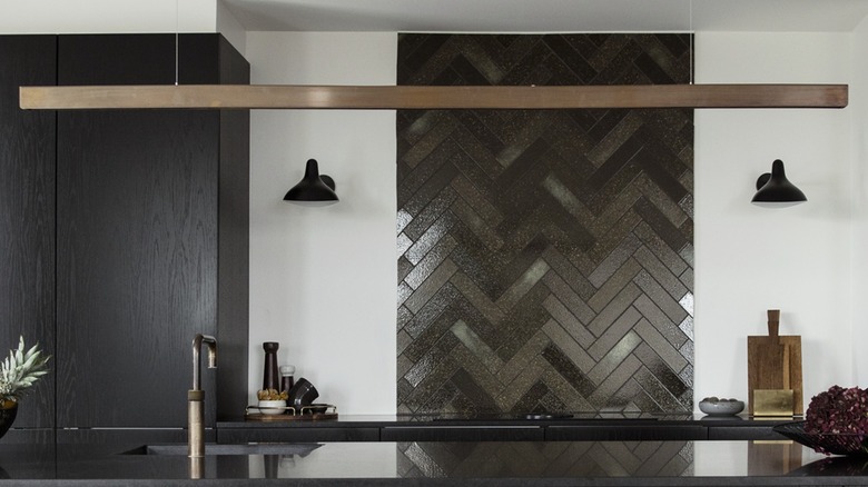 Speckled brown lava stone used as a backsplash