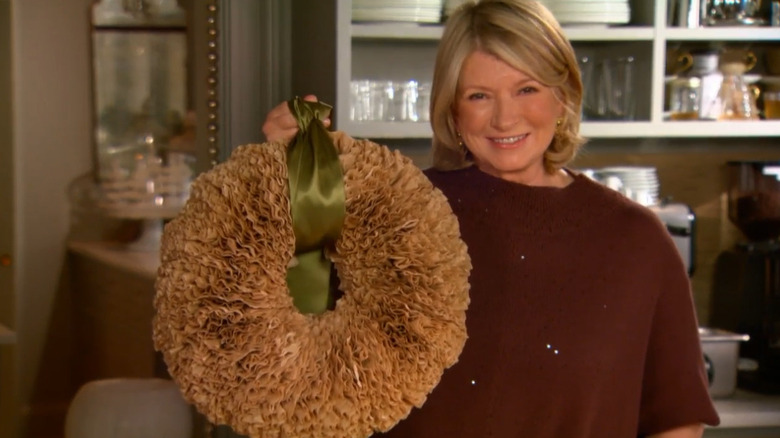 Martha Stewart displays a wreath made from coffee filters