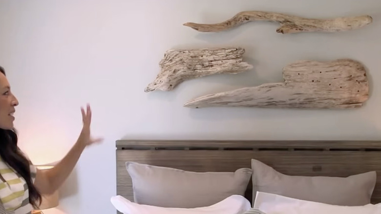 Joanna Gaines showing driftwood accent pieces
