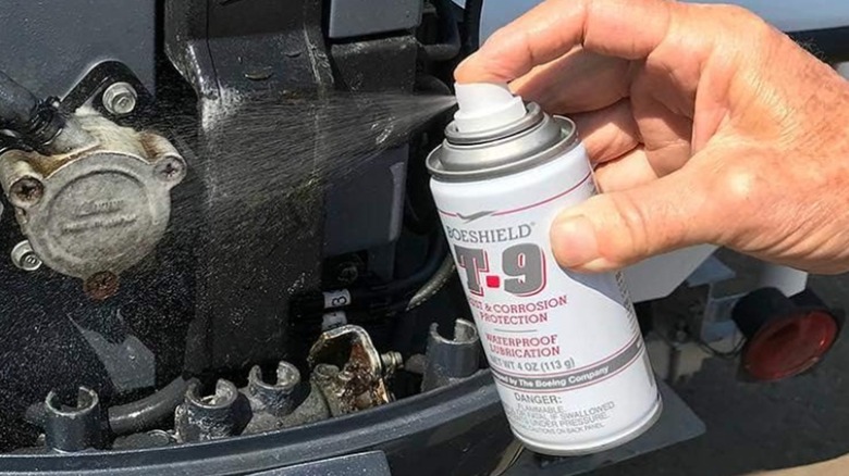 Person spaying Boeshield T-9 on engine parts