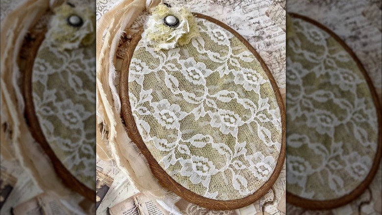 Lace curtain turned into wall art with embroidery hoop