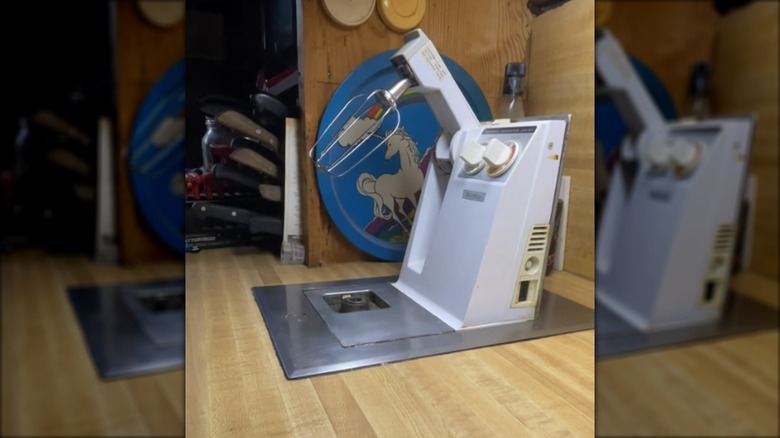A vintage Ronson Foodmatic built-in mixer, food processor, and multipurpose appliance