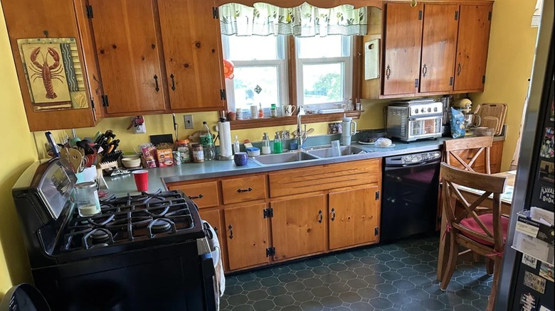 An old kitchen with knotty pine