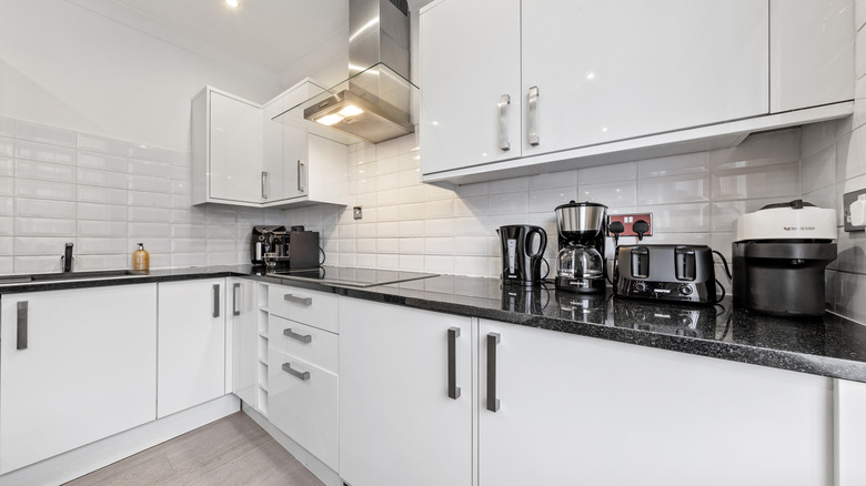 somewhat cluttered kitchen counter