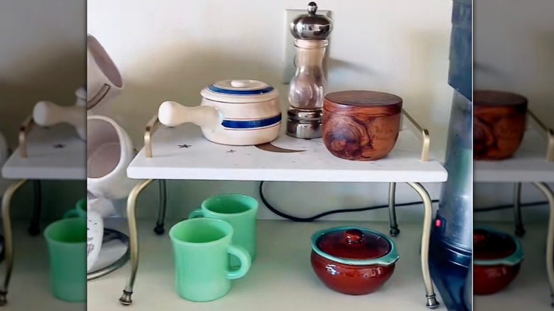 thrift store riser craft to create cabinet space