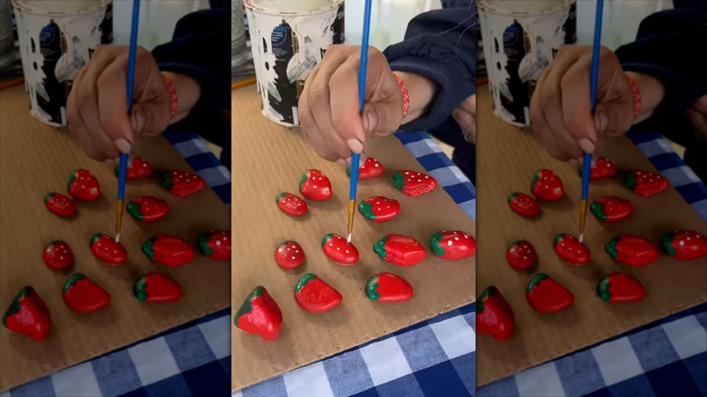 Stones painted to look like strawberries