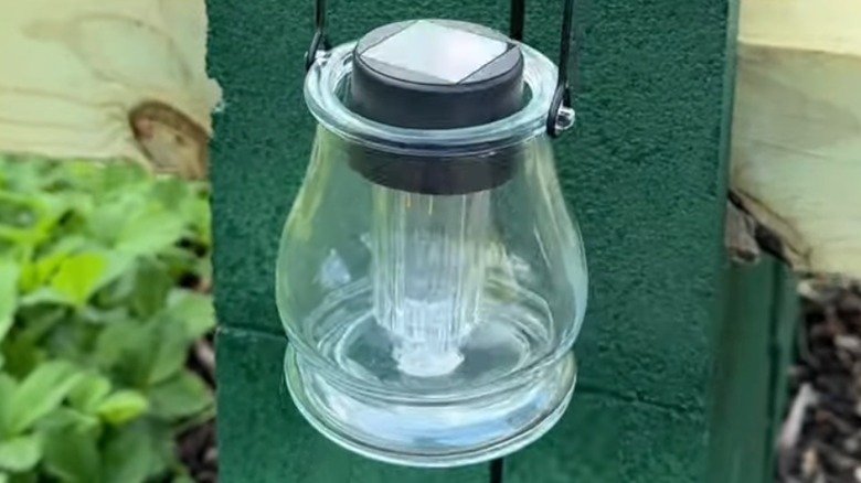 Hanging light fixture made with solar landscape light