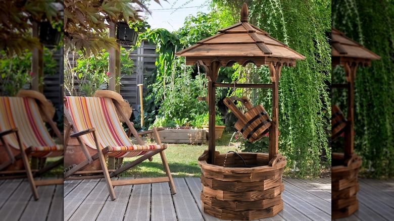 Giantex wishing well fountain sitting on a patio