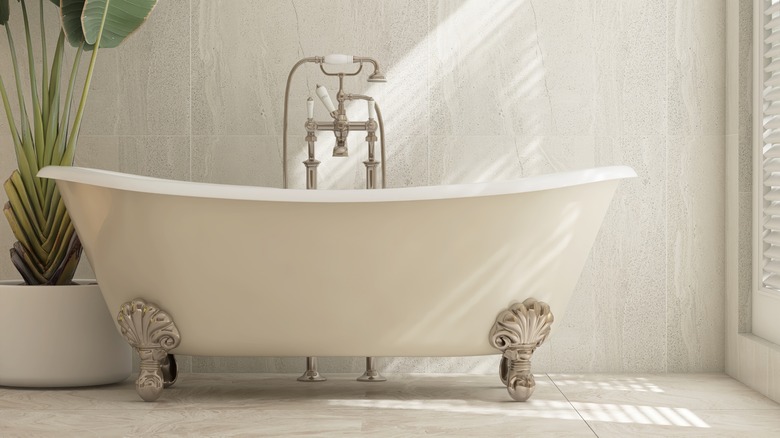 a white bathtub in a bathroom