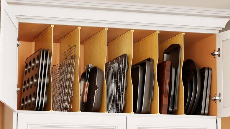 SpaceAid Cabinet Tray Dividers in upper cabinet to organize baking sheets and trays