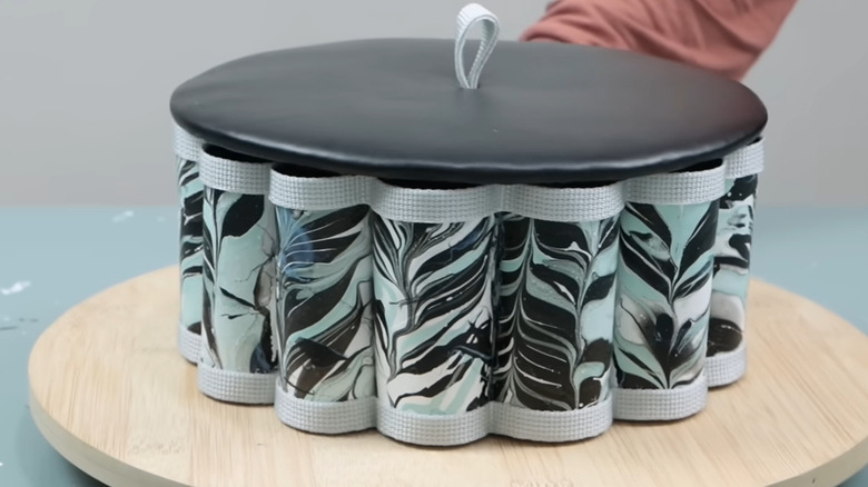 Scalloped edge storage container made from toilet paper tubes