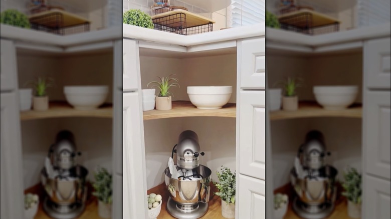 Corner cabinet with the lazy susan shelves and door removed and new shelves installed