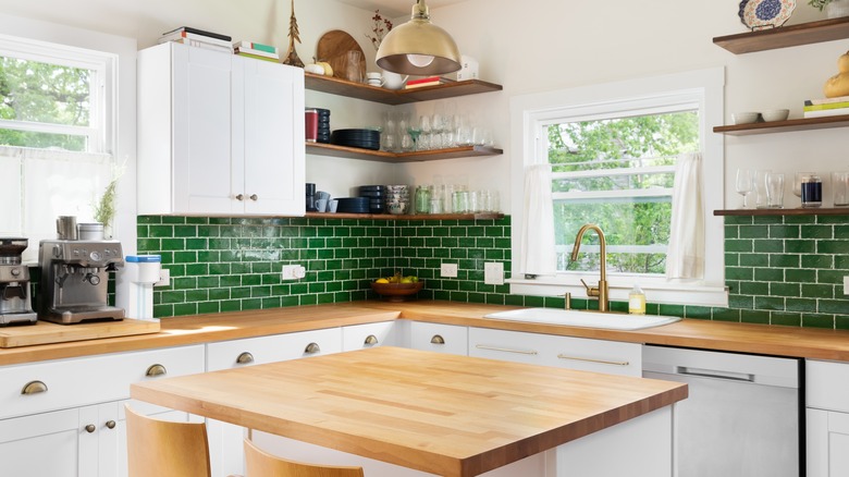 a bold green backsplash in a kitchen