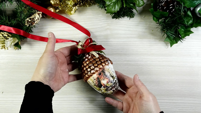 a homemade acorn-cap orb ornament