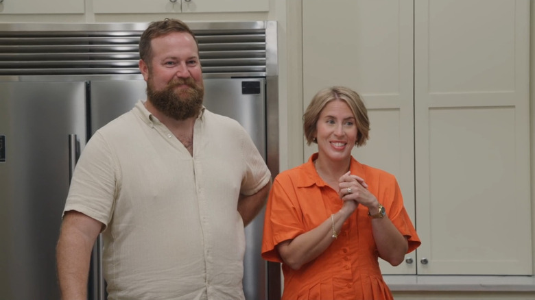 Ben and Erin Napier standing in neutral kitchen