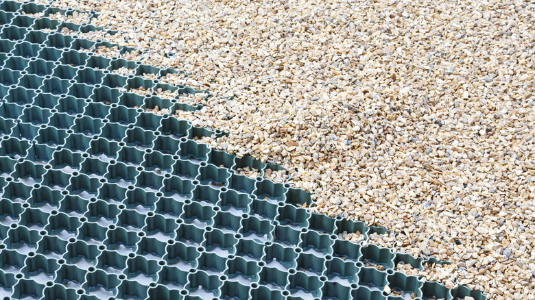 Gravel grid with gravel laid over top