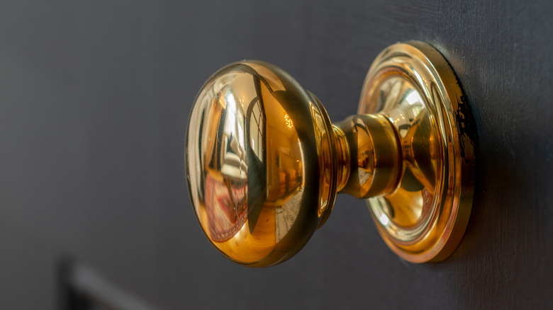 A shiny brass doorknob